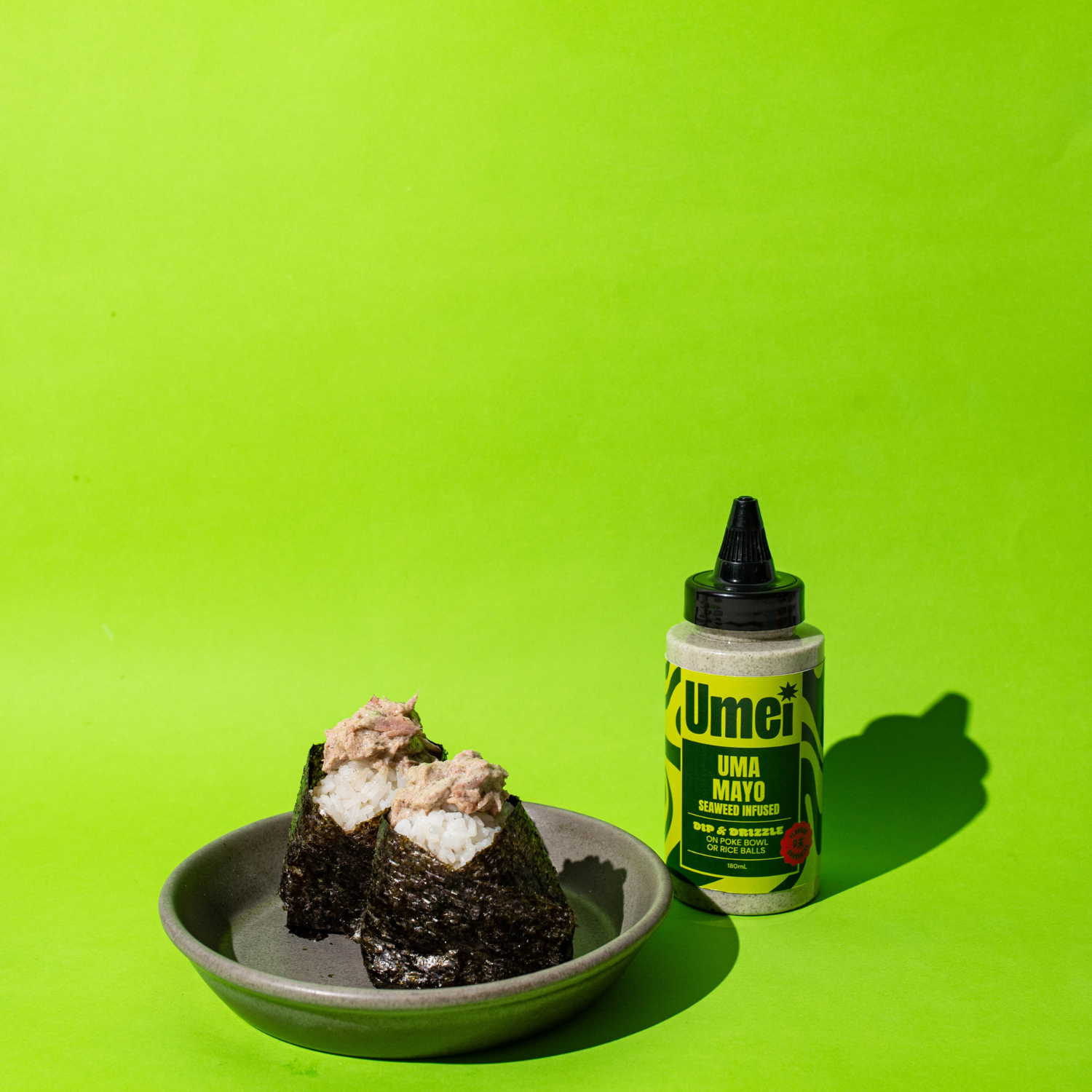 Umei Uma Mayo and Tuna Mayo Onigiri on green background